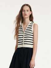 a lady in strip knitted vest top